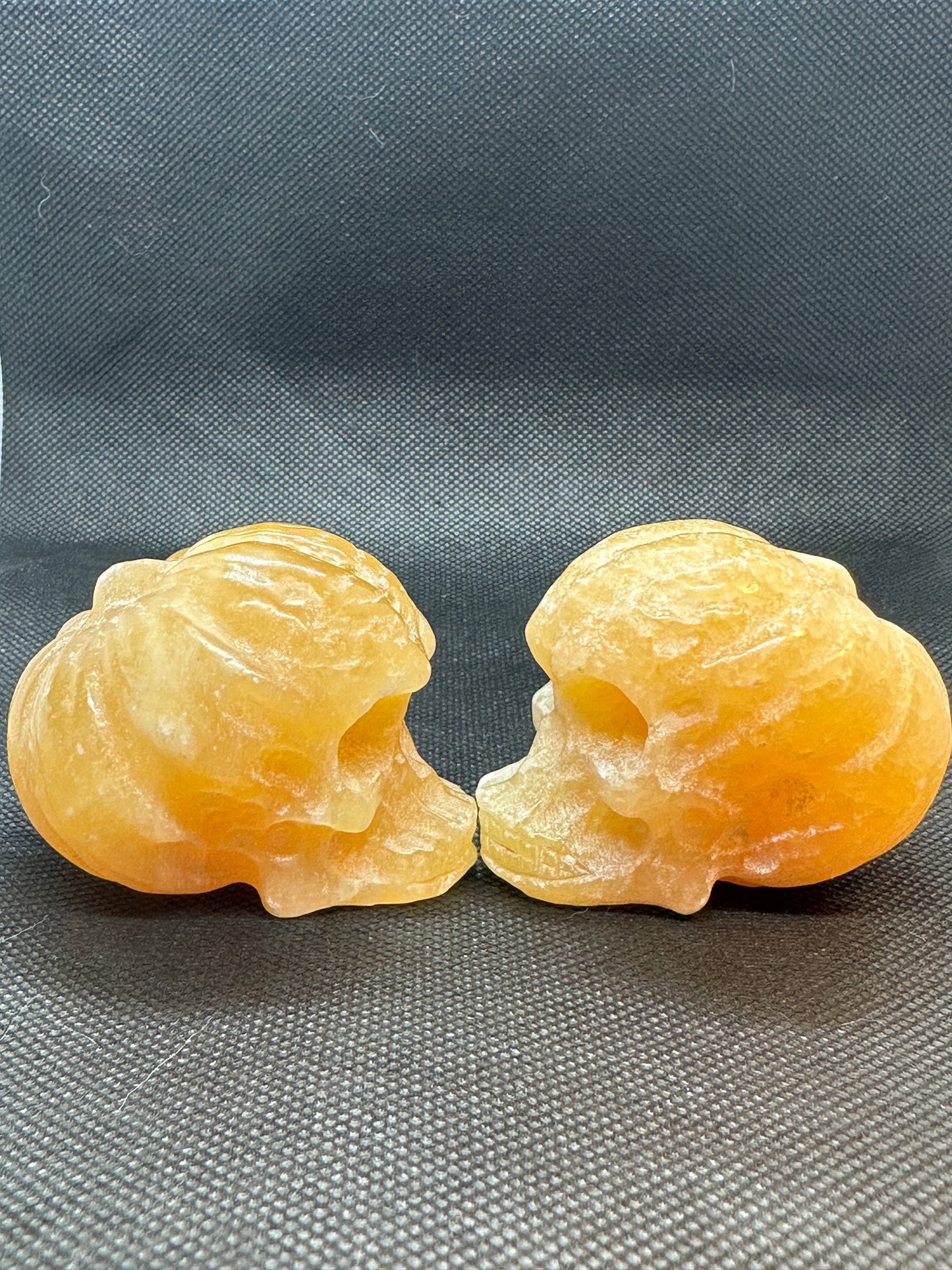 Orange Calcite Skull with Pumpkin Brain Carving